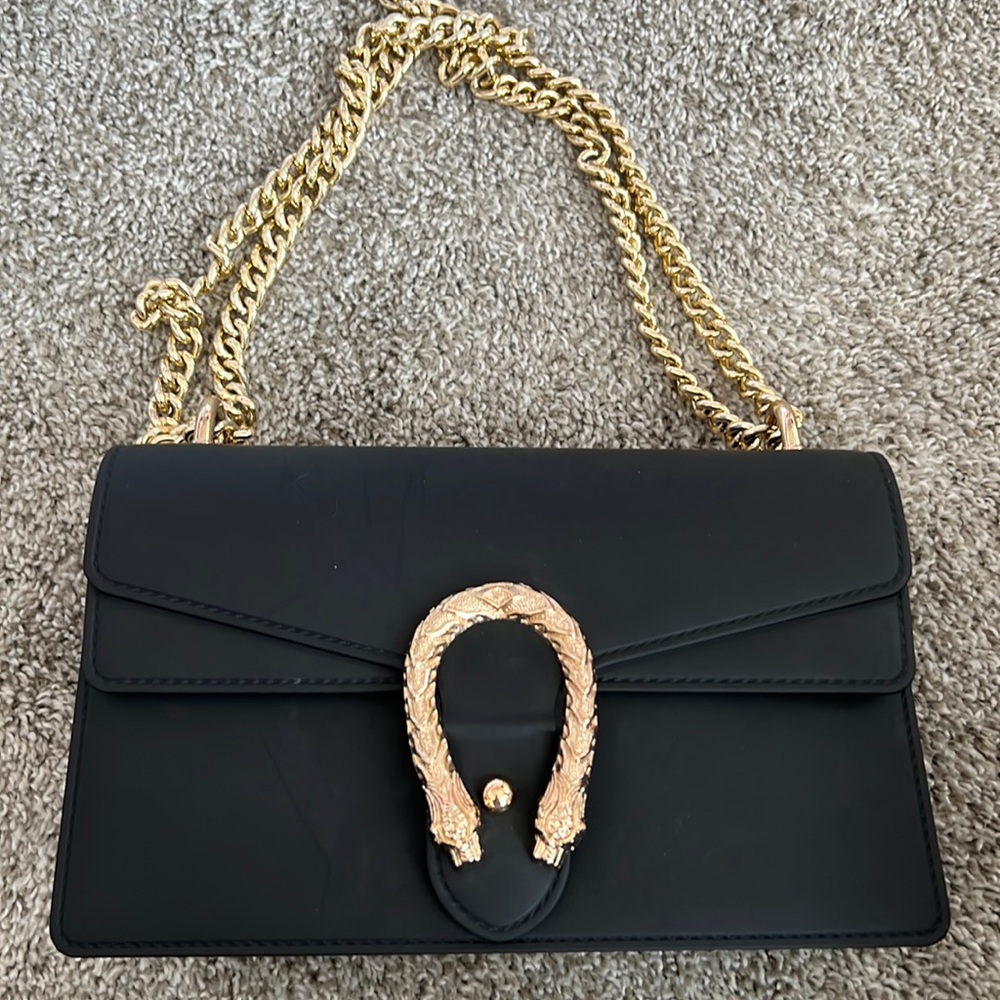 Black purse with chain